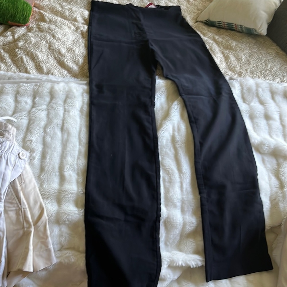 Black Geesy stretch straight leg pants with zipper in back